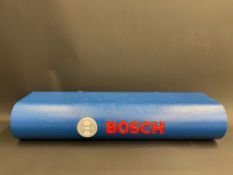 A Bosch wall mounted lightbox, 26" w x 5" h x 7" d.