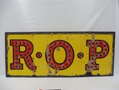 An early R.O.P. enamel sign, unusually with inset red glass reflectors, the sign attached to a board