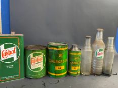 A Wakefield Castrol 7lb grease tin, a second for BP, a BP Energol quart cylindrical can and three