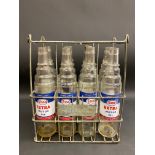An Esso eight division oil bottle garage forecourt crate, containing eight Esso Extra quart oil