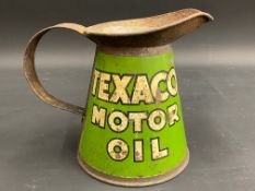 A Texaco Motor Oil quart measure, wide neck version.