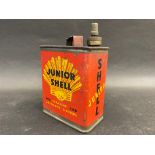 A Junior Shell lighter fluid tin.