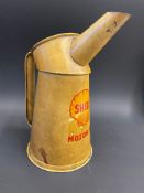 A Shell Motor Oil quart measure, dated 1951.