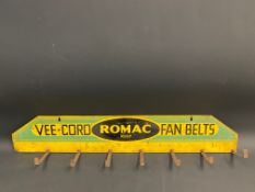 A Romac Fan Belts wall mounted tin hanging rack, 33 x 5 3/4".