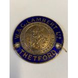 A blue enamel and nickel plated circular supply plate for W.& G. Lambert of Thetford.