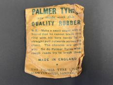A Palmer Tyres promotional rubber ring in original packaging.