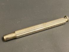 An Ernest Newton & Co. Notwen Motor Oil silver plated pencil.