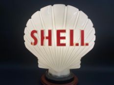 A Shell glass petrol pump globe, with damage to the neck.