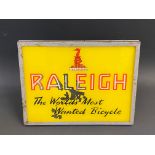A Raleigh 'The World's Most Wanted Bicycle' lightbox, 14" w x 10 1/2" h x 6 1/2" d.