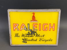 A Raleigh 'The World's Most Wanted Bicycle' lightbox, 14" w x 10 1/2" h x 6 1/2" d.