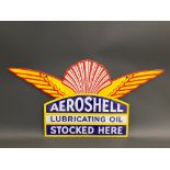 An Aeroshell Lubricating Oil Stocked Here double sided enamel sign in good condition, with some