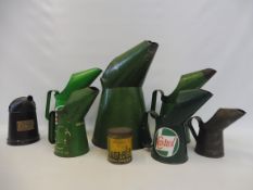 A selection of Castrol oil measures.