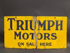 A Triumph Motors on sale here rectangular enamel sign, 30 x 15".