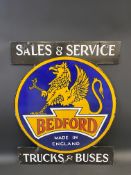 A rare Bedford Trucks and Buses double sided enamel sign with an image of a griffin to either