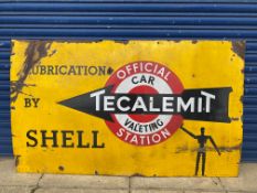A large Tecalemit 'Lubrication by Shell' rectangular enamel sign with robot/stick man motif, 60 x