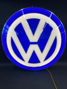 A VW circular illuminated garage showroom sign, 38" diameter.