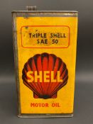 A Shell Motor Oil 'Triple Shell SAE 50'gallon can of bright colour.