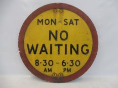 A No Waiting circular road sign, 20" diameter.