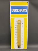 A Duckhams enamel thermometer by Burnham of London in excellent condition, with the original