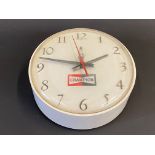 A Champion spark plugs circular dealership wall clock, 6 1/2" diameter.