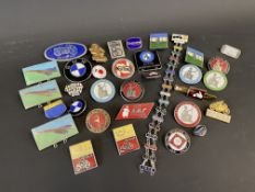 A selection of enamel lapel badges including Peterborough Rally, Britannia Rally etc.