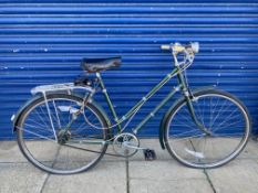 BSA lady's bicycle with Brooks saddle and a Miller headlamp.