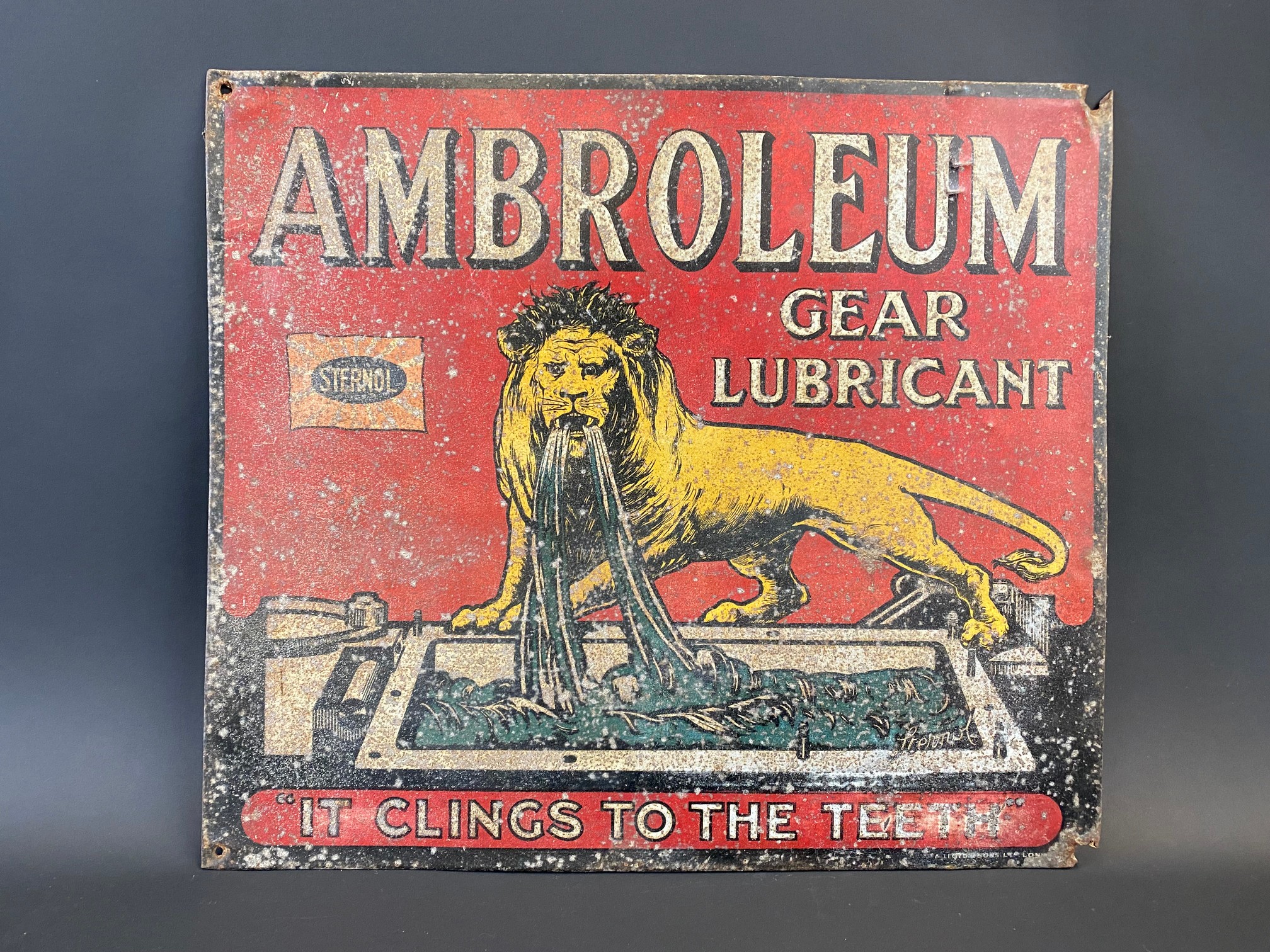 A rare Ambroleum Gear Lubricant by Sternol pictorial tin advertising sign, 17 x 15".