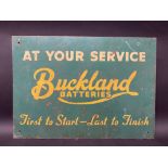 A Buckland Batteries rectangular tin advertising sign, 21 x 15".