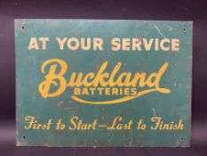 A Buckland Batteries rectangular tin advertising sign, 21 x 15".