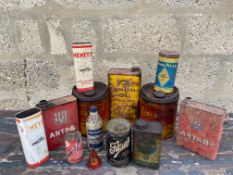 A box of assorted oil cans.