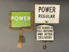 Two small Power petrol pump brand indicator signs plus an enamel sight glass sign.