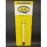 A Duckham's 20-50 Motor Oil enamel sign, 13 x 36".
