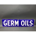 A Germ Oils rectangular enamel sign with good gloss, 42 x 10".