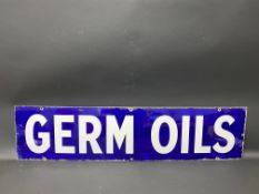 A Germ Oils rectangular enamel sign with good gloss, 42 x 10".