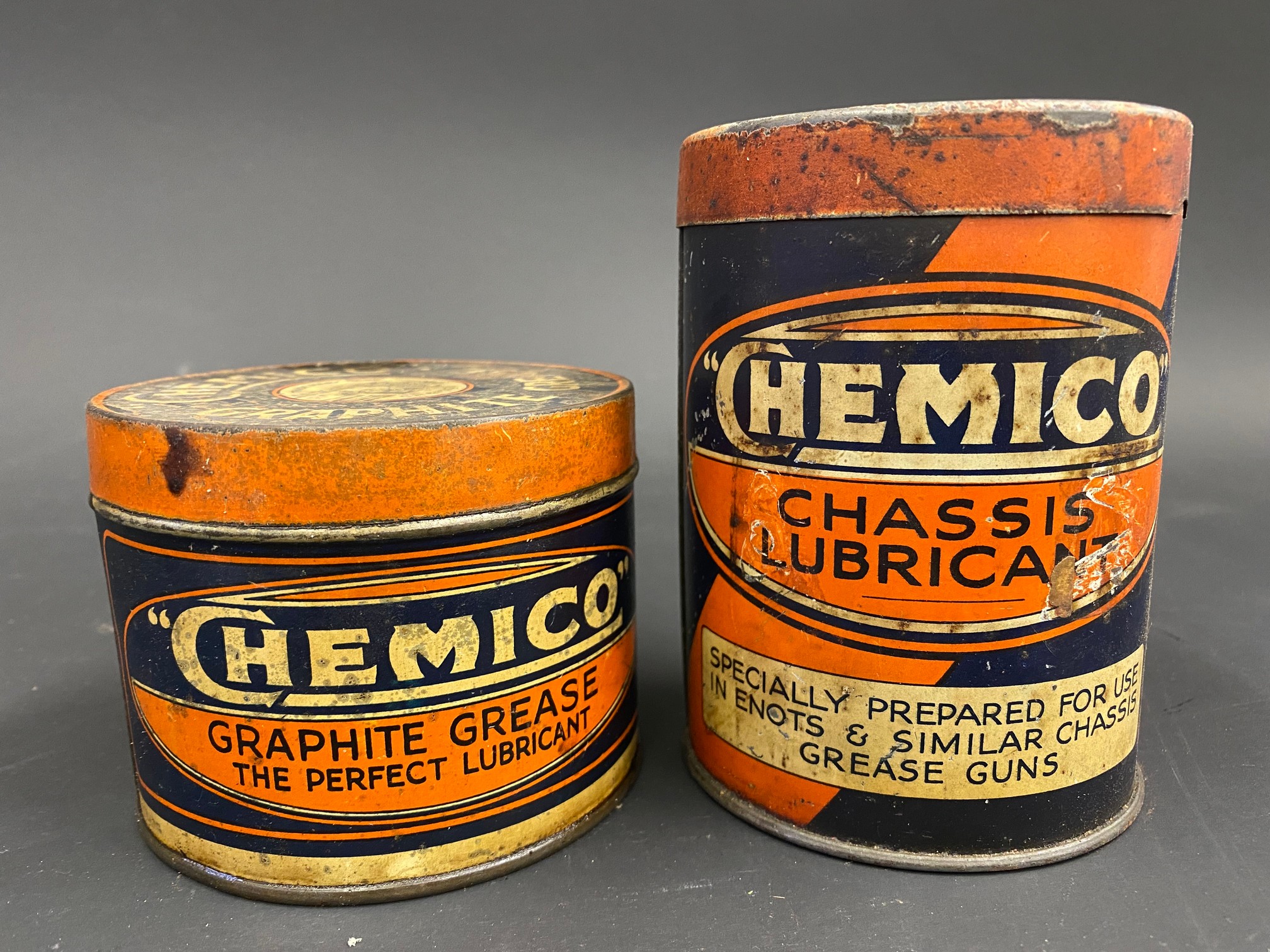 A Chemico Graphite Grease tin and a Chemico Chassis Lubricant tin.