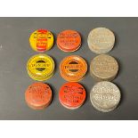 Nine miniature Dunlop chalk and patch tins.