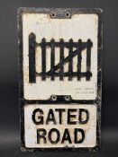 A REPRODUCTION aluminium road sign for Gated Road, by Ham Baker Co. Limited, 12 x 21".