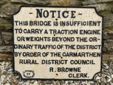 An early cast iron Notice road sign informing that the bridge 'is insufficient to carry a traction