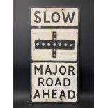 A metal road sign 'Slow Major Road Ahead, with glass reflective discs, 14 x 27 1/2".