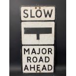 A large road sign for Slow Major Road Ahead, 14 x 27 1/2".