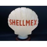 A Shellmex glass petrol pump globe by Hailware, fully stamped and dated underneath, March 1974,