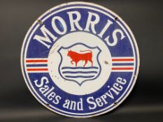 A Morris Sales and Service circular double sided enamel sign, 28 1/2" diameter.