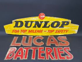 A Dunlop cardboard advertising pediment sign, 39 x 12 1/2", plus a two piece Lucas Batteries hanging