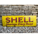 A Shell Shortens Every Road rectangular enamel sign, 54 x 18".