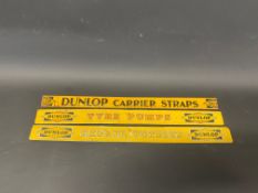 A Dunlop Carrier Straps advertising shelf strip and two later Dunlop shelf strips.