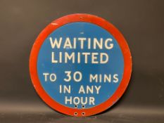 A circular 'Waiting Limited To 30 Mins in any Hour' road sign, 20" diameter.