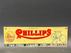 A small Phillips Cycles part pictorial tin advertising sign, 12 x 4".