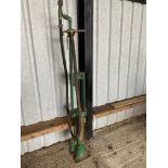 A Wayne skeleton petrol pump for restoration, with rubber hose and bronze nozzle.