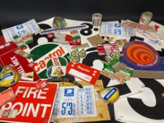 A quantity of garage related stickers and promotional material.