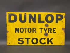 An early Dunlop Motor Tyre Stock rectangular double sided enamel sign, lacking hanging flange and